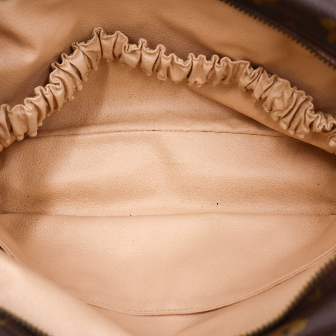 Louis Vuitton Trousse Toilette Clutch 28