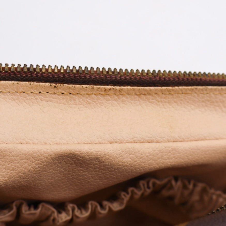Louis Vuitton Trousse Toilette Clutch 28