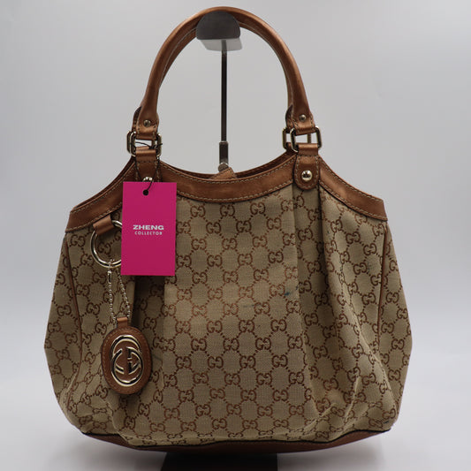 Gucci Sukey GG Vintage Monogramm - 563