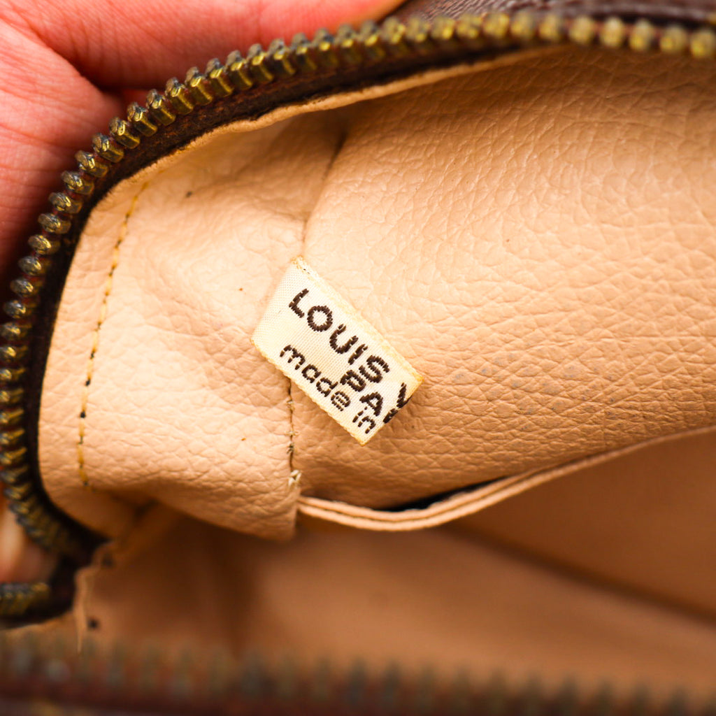 Louis Vuitton Trousse Toilette Clutch 28
